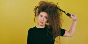 How Can I Tame Frizzy Hair Without Heavy Products?
